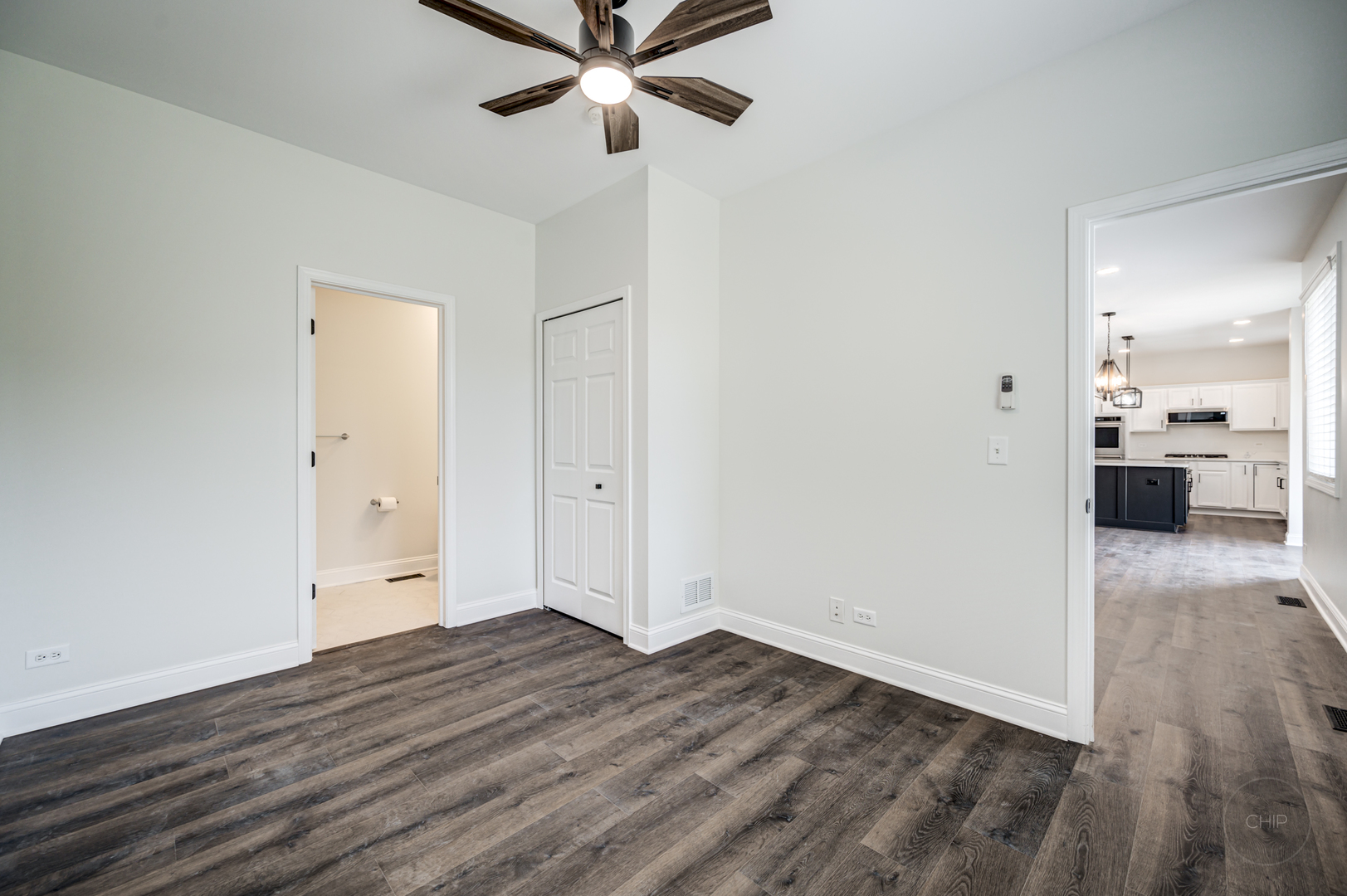 12948 Parterre Place Plainfield, IL 60585 - Photo 19 of 35 wooden floor in an empty room