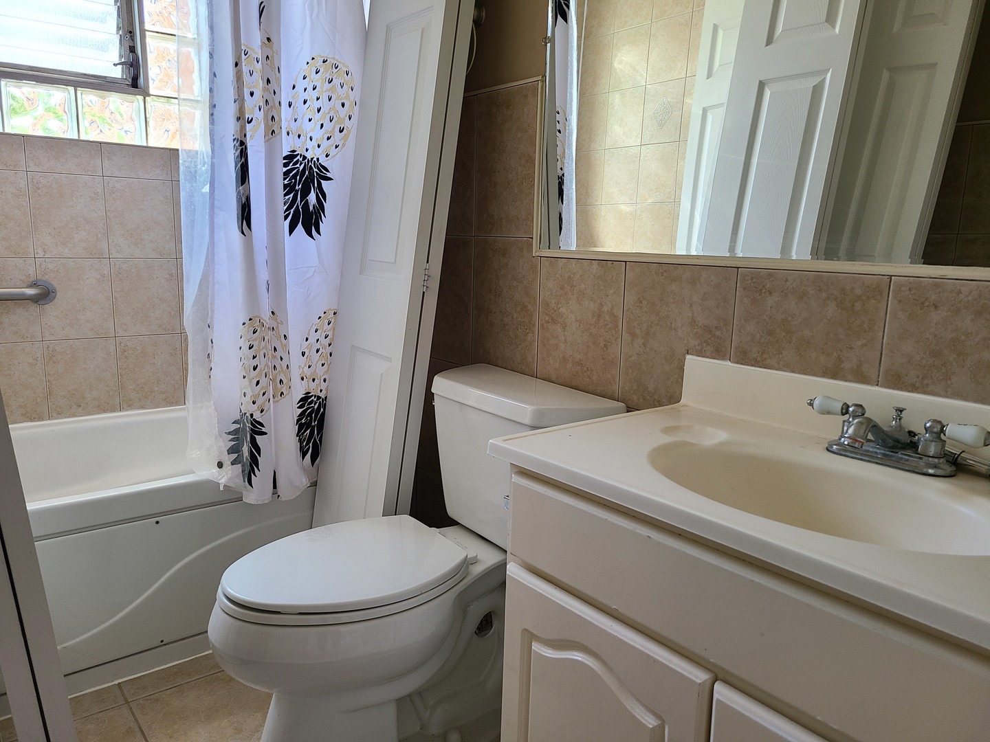 8161 Niles Center Road, Unit 2D Skokie, IL 60077 - Photo 18 of 23 a bathroom with a sink toilet and shower