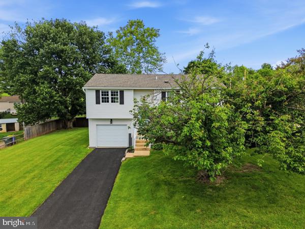 3496 Fox Ridge Court Dover, PA 17315 - Photo 28 of 35 a front view of a house with a yard