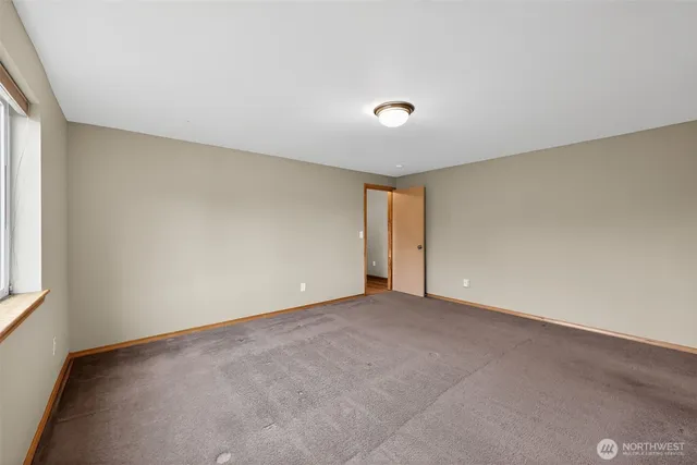 an empty room with window