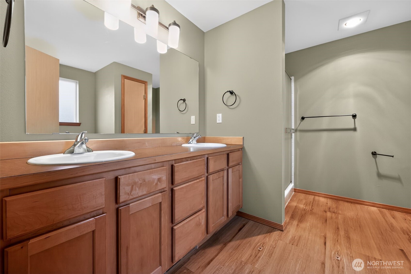 222 Oyler Road Ethel, WA 98542 - Photo 20 of 34 a bathroom with a sink and a mirror
