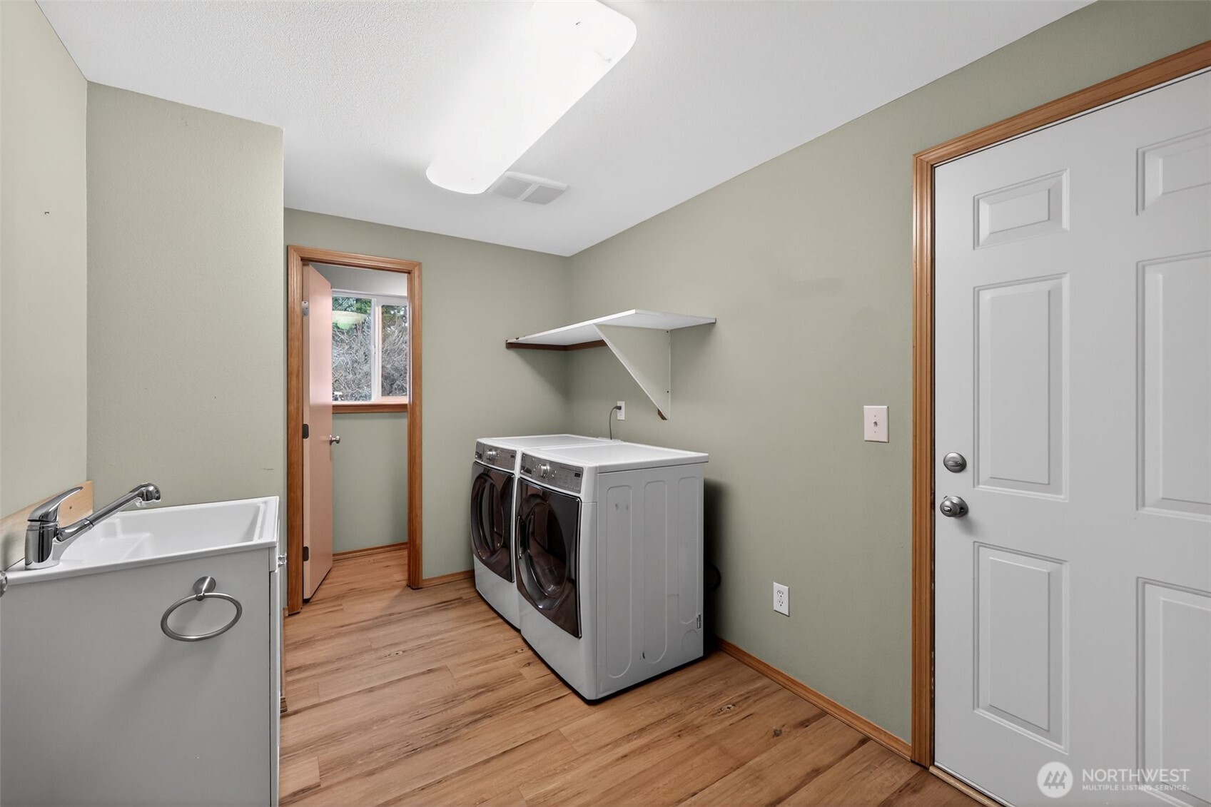 222 Oyler Road Ethel, WA 98542 - Photo 21 of 34 a view of a storage & utility room with wooden floor