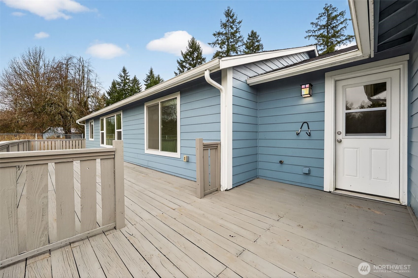 222 Oyler Road Ethel, WA 98542 - Photo 23 of 34 a view of a house with a balcony
