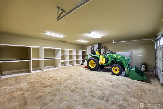 a view of a garage with wooden floor