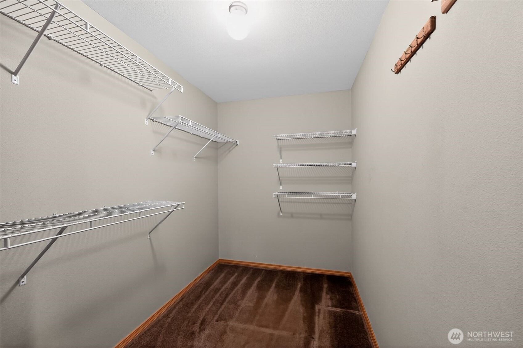 222 Oyler Road Ethel, WA 98542 - Photo 10 of 34 a view of walk in closet with empty racks