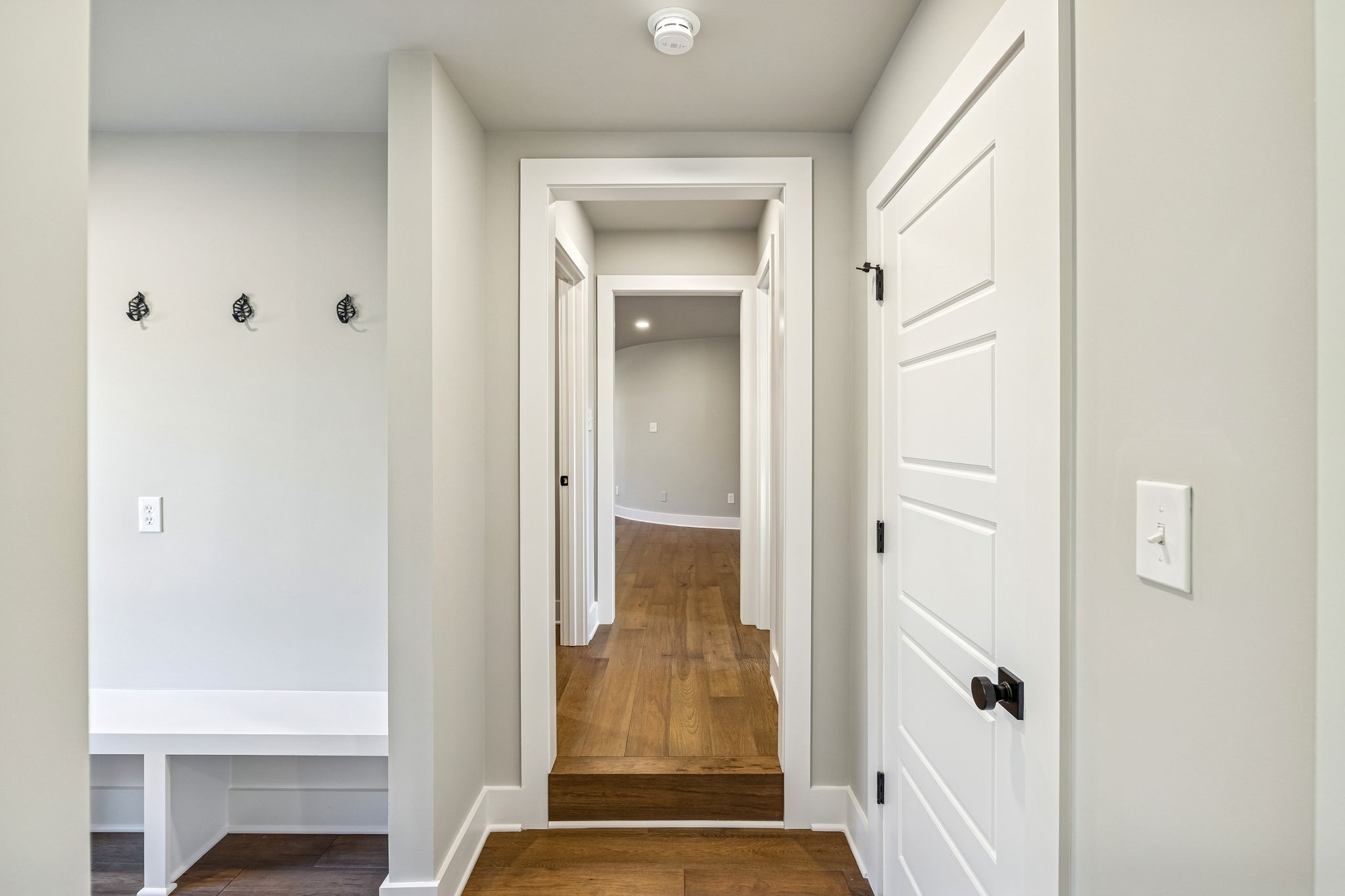 628 Vaughan's Gap Road Spring Hill, TN 37174 - Photo 17 of 45 a view of a hallway with wooden floor
