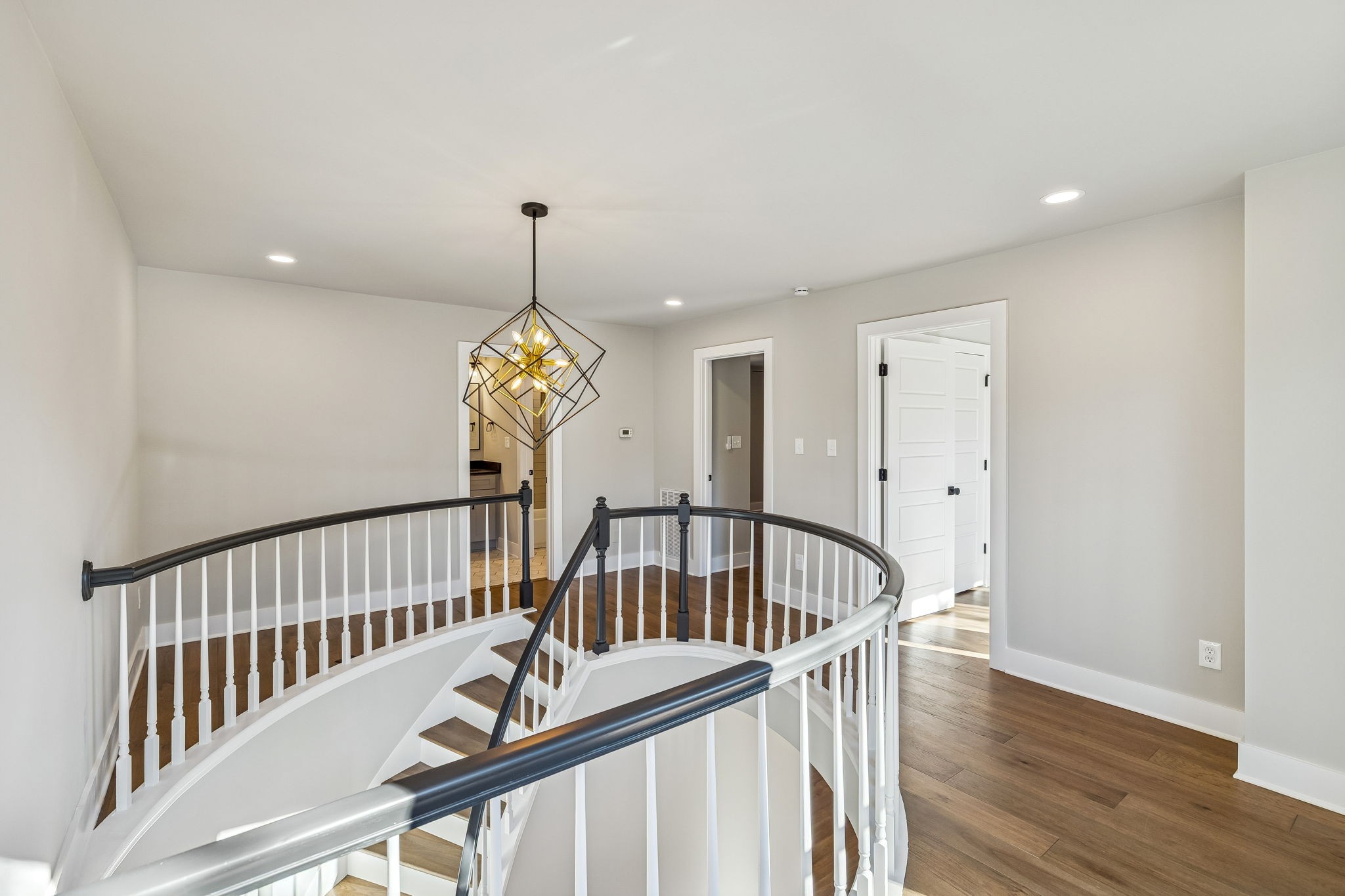 628 Vaughan's Gap Road Spring Hill, TN 37174 - Photo 25 of 45 a view of hallway with wooden floor and windows