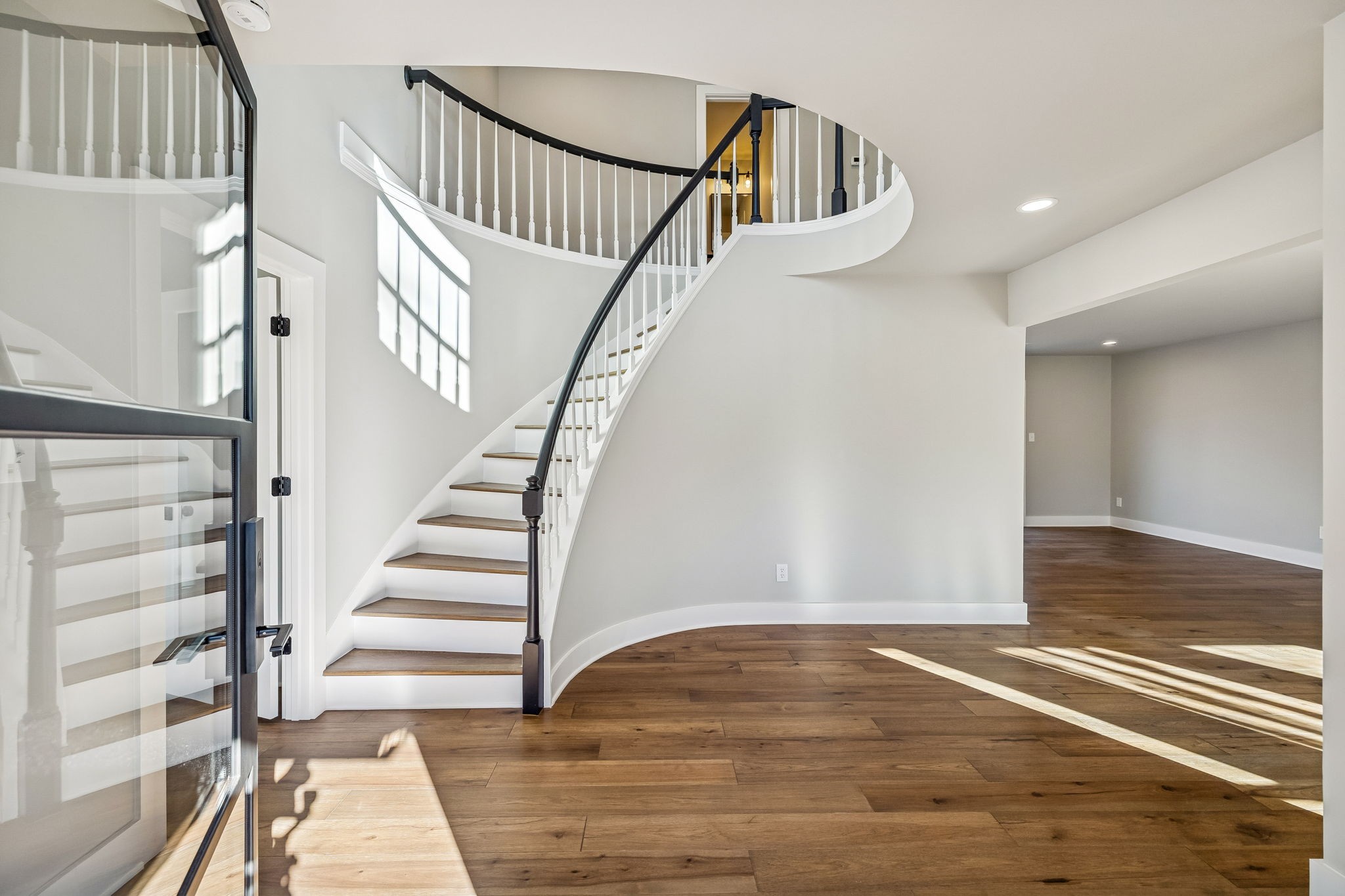 628 Vaughan's Gap Road Spring Hill, TN 37174 - Photo 3 of 45 a view of entryway and hall with wooden floor