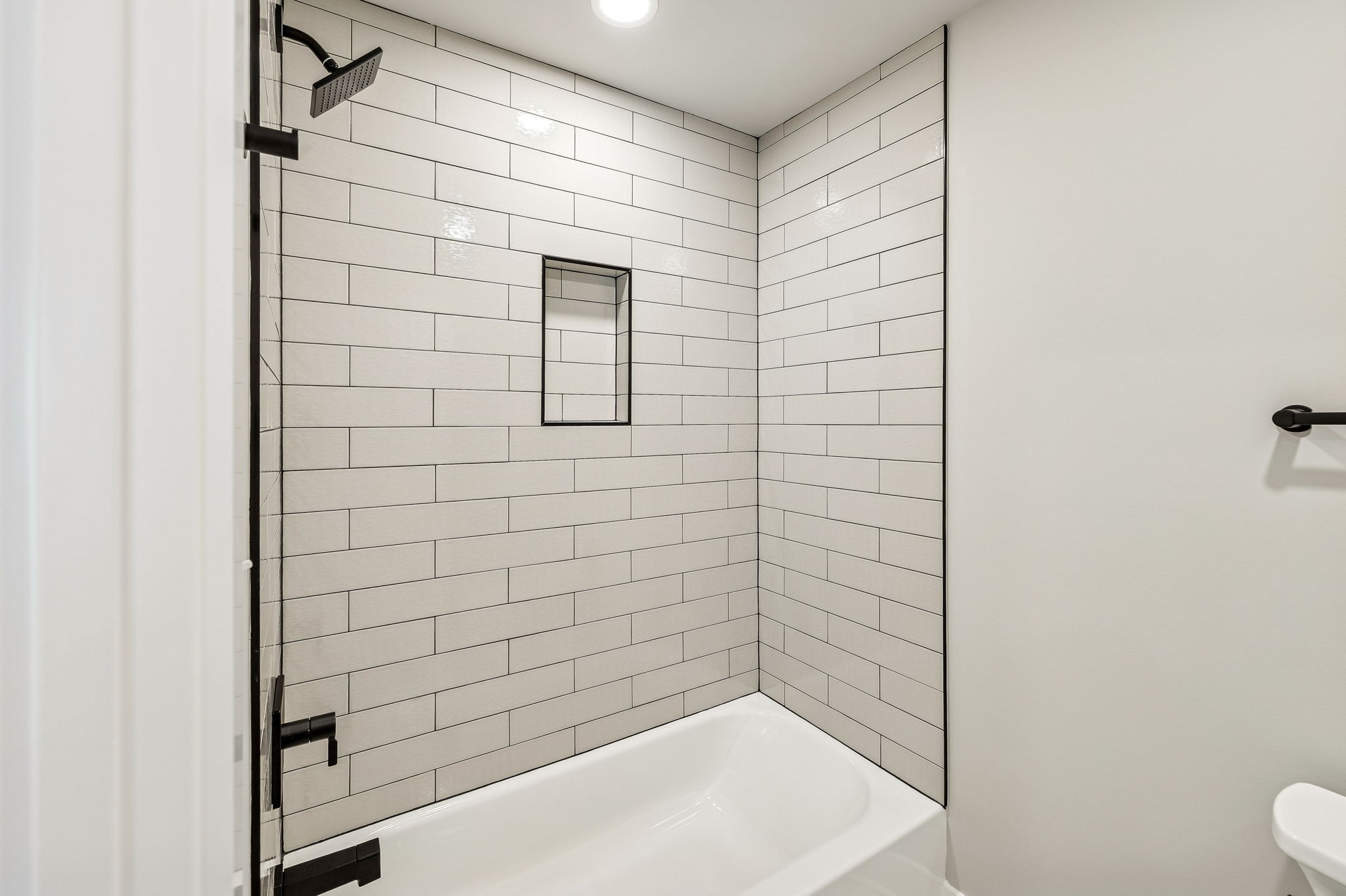 628 Vaughan's Gap Road Spring Hill, TN 37174 - Photo 31 of 45 a bathroom with a shower and a toilet