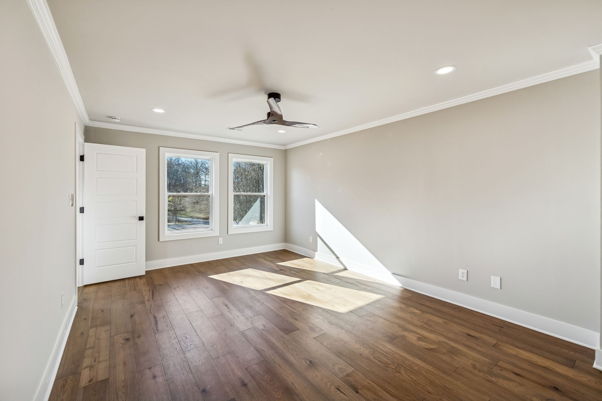 628 Vaughan's Gap Road Spring Hill, TN 37174 - Photo 33 of 45 a view of an empty room with wooden floor and a window