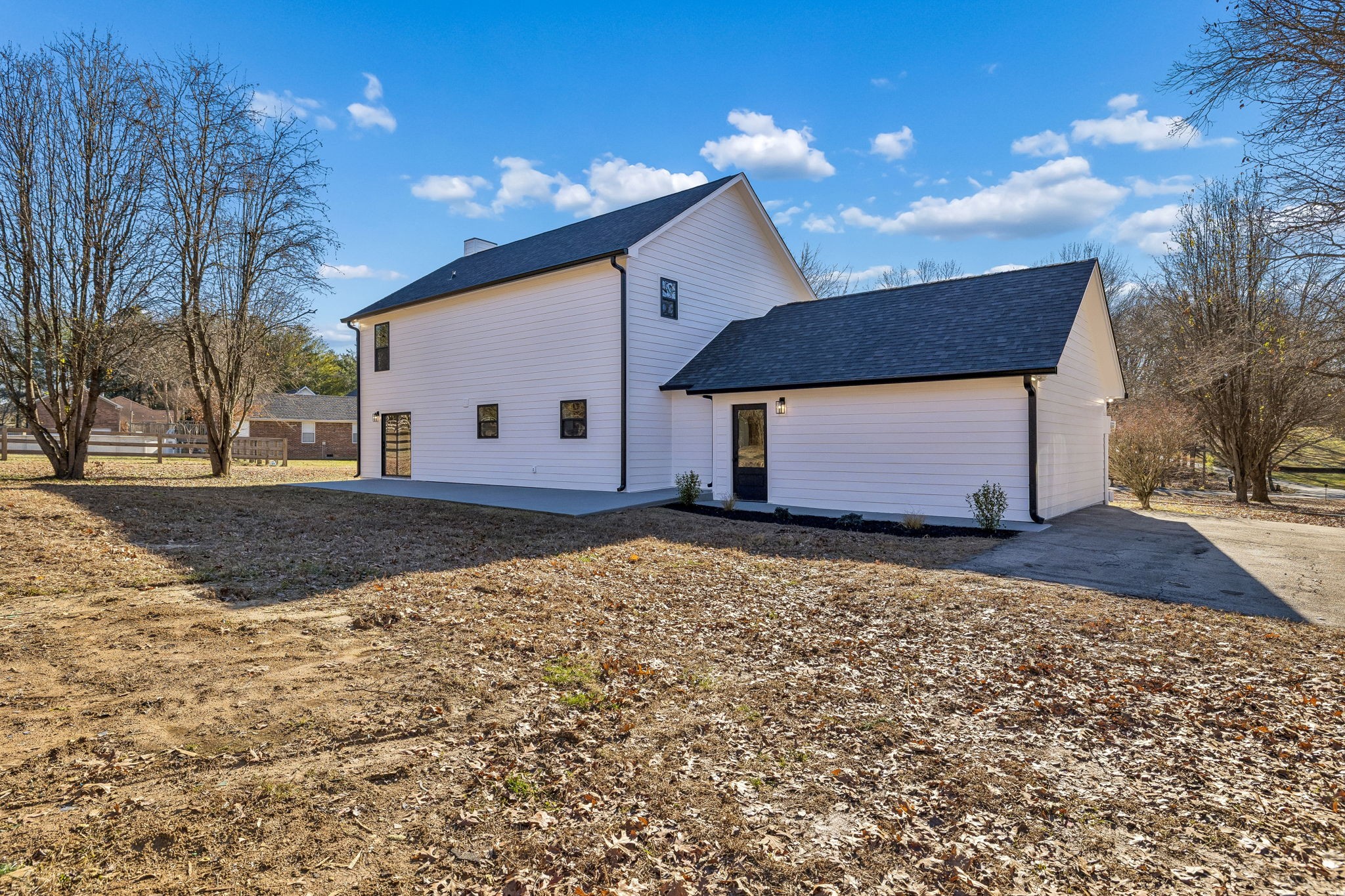 628 Vaughan's Gap Road Spring Hill, TN 37174 - Photo 43 of 45 a house view with a backyard space