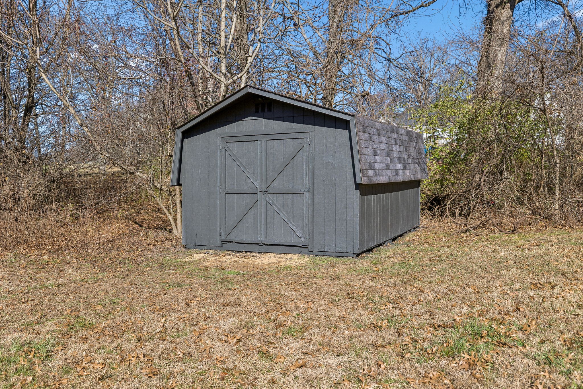 628 Vaughan's Gap Road Spring Hill, TN 37174 - Photo 44 of 45 a house with trees in the background