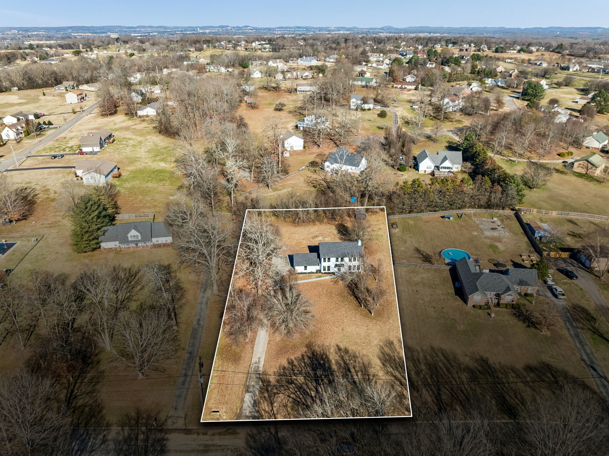 628 Vaughan's Gap Road Spring Hill, TN 37174 - Photo 45 of 45 an aerial view of a house with a yard
