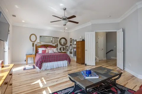 a view of hallway with wooden floor