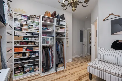 a view of a livingroom with furniture and workspace