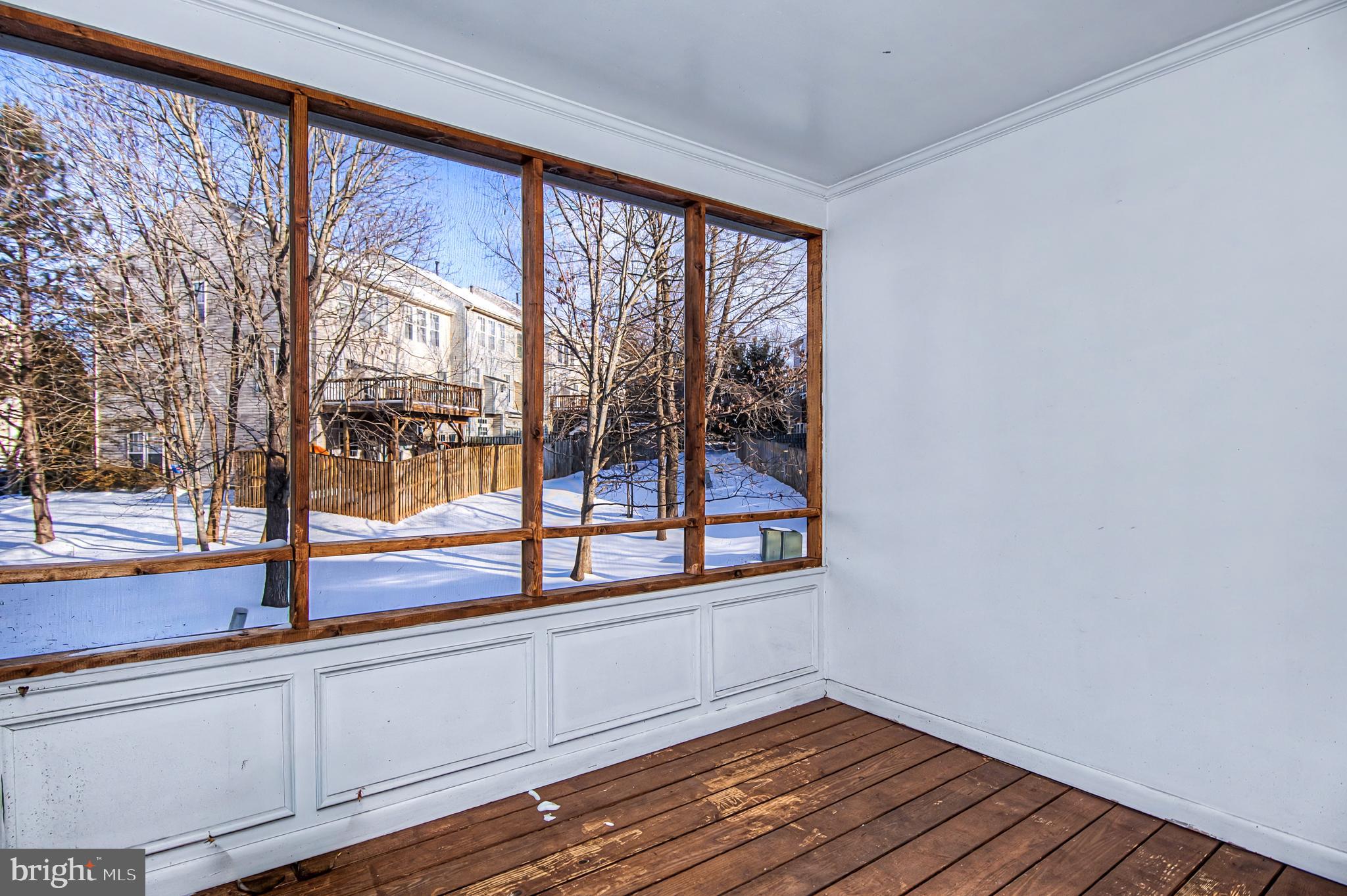 10159 Elgin Way Bristow, VA 20136 - Photo 12 of 41 a view of a room with wooden floor and a window