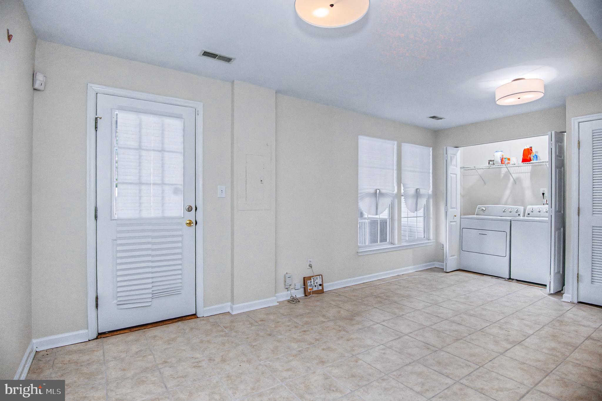 10159 Elgin Way Bristow, VA 20136 - Photo 33 of 41 a view of an empty room with a window