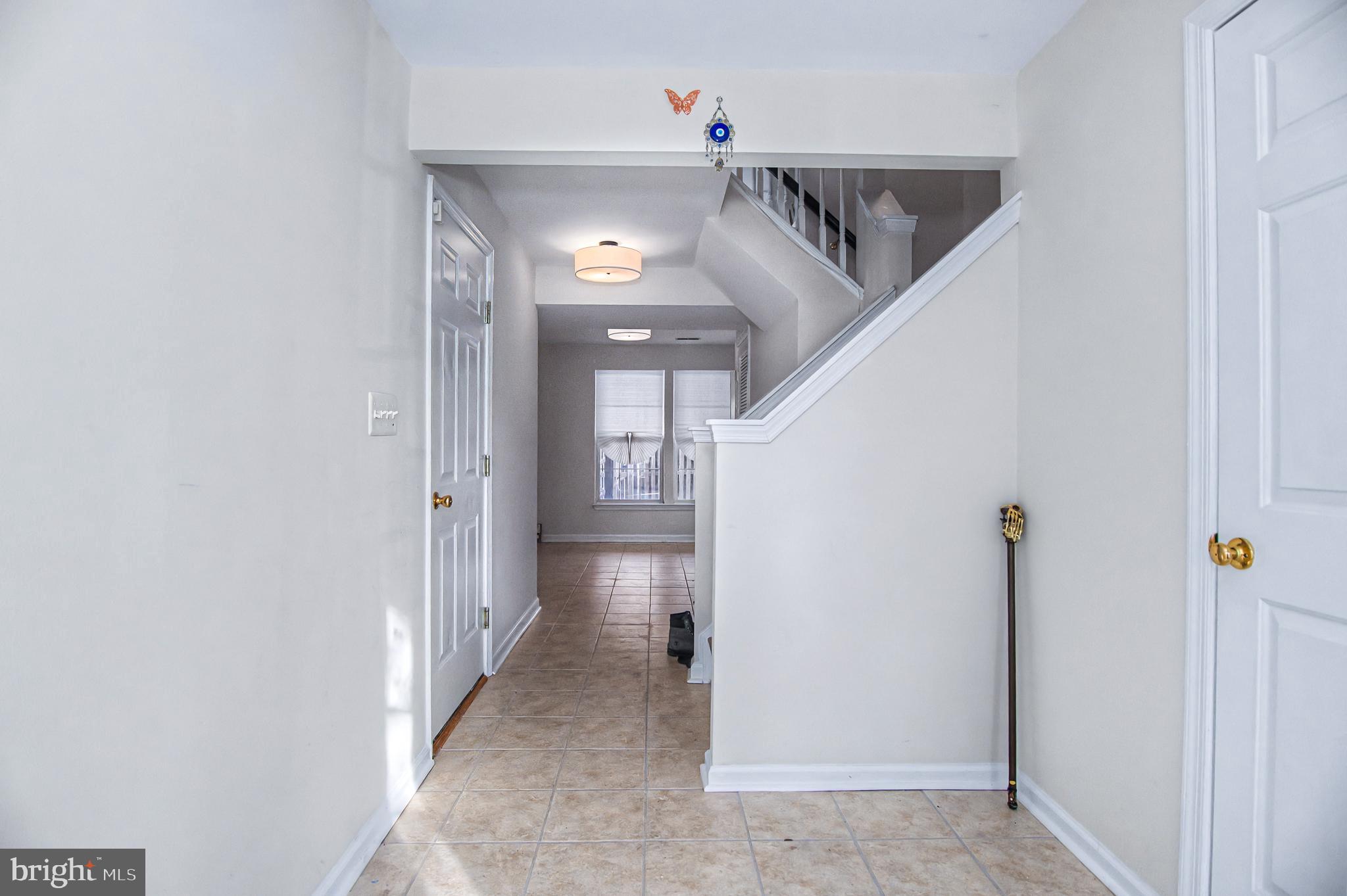 10159 Elgin Way Bristow, VA 20136 - Photo 35 of 41 a view of hallway with stairs