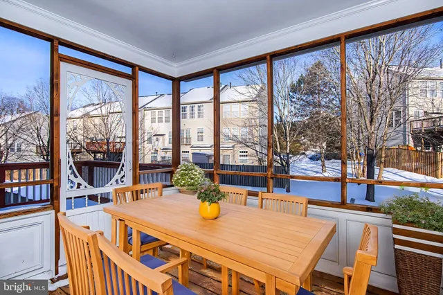 a view of a dining room and livingroom with furniture