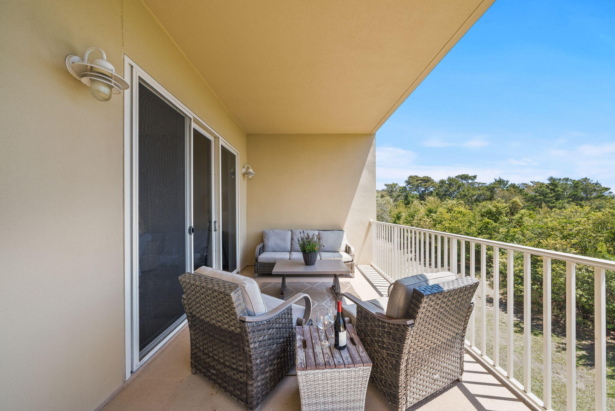 1653 West County Highway 30A, Unit 2105 Santa Rosa Beach, FL 32459 - Photo 20 of 42 a balcony with furniture and a potted plant