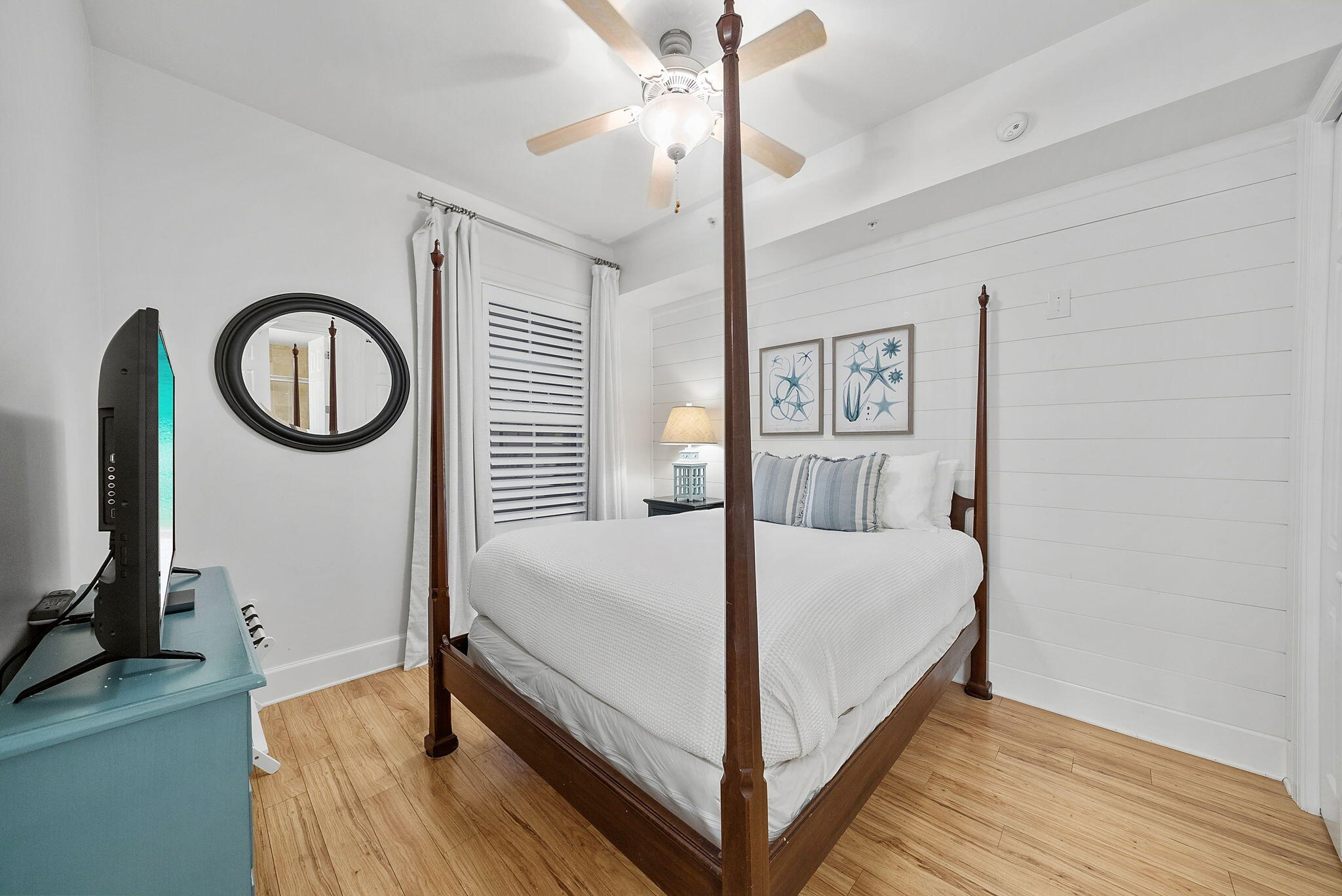 1653 West County Highway 30A, Unit 2105 Santa Rosa Beach, FL 32459 - Photo 22 of 42 a bed sitting in a spacious bedroom next to a bathroom