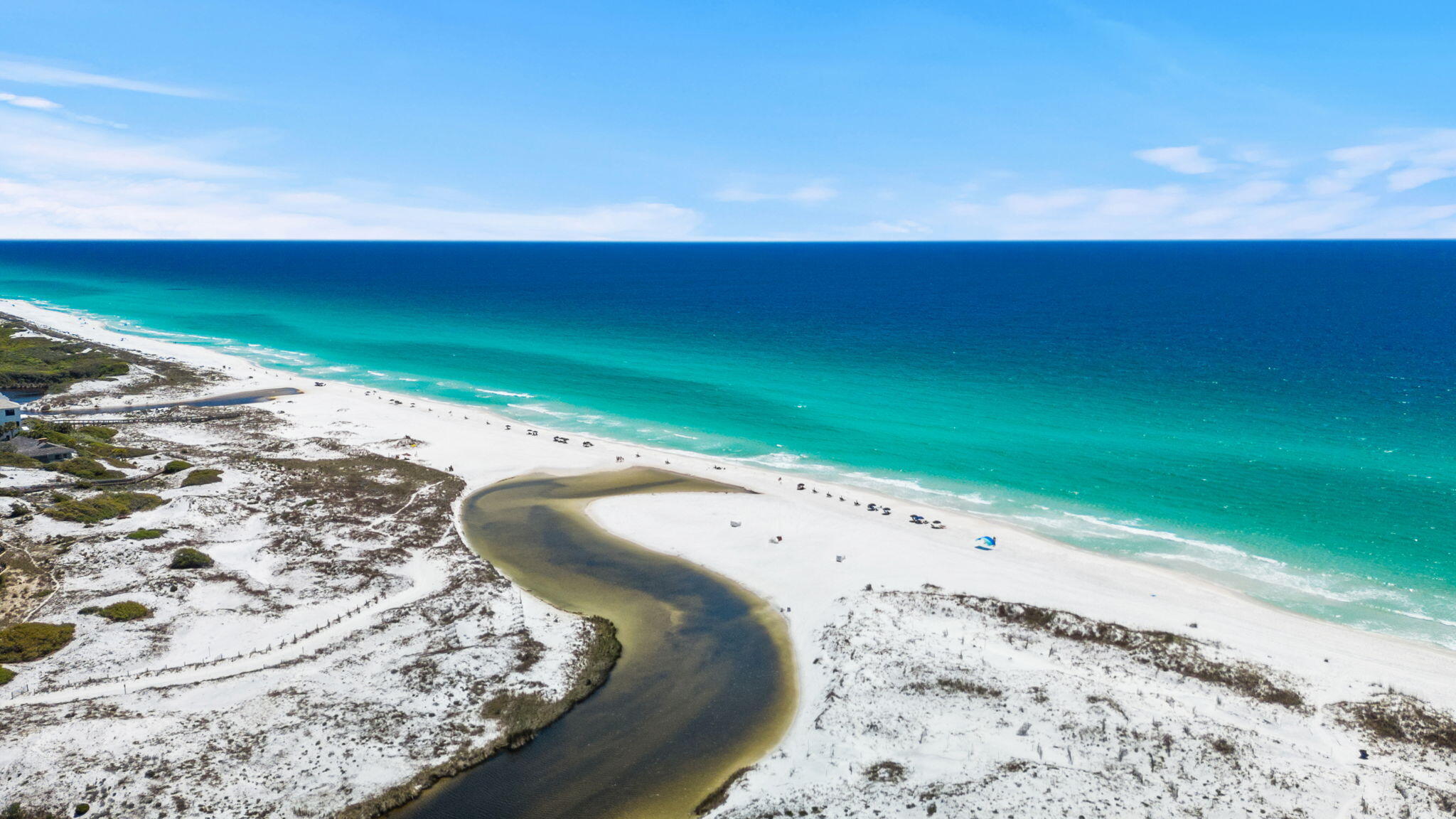 1653 West County Highway 30A, Unit 2105 Santa Rosa Beach, FL 32459 - Photo 40 of 42 a view of a lake with a yard