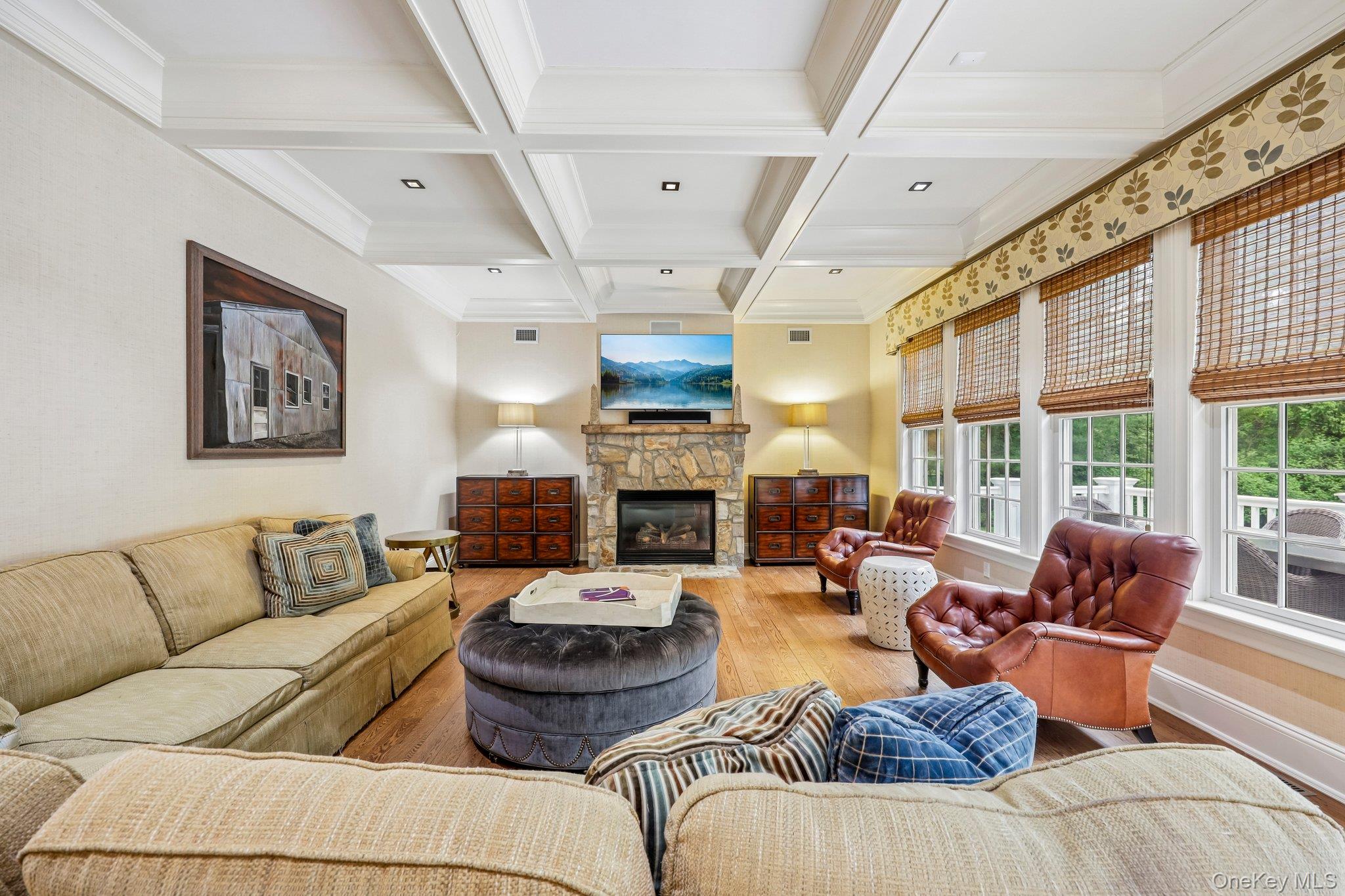 5 Mill Road Lloyd Harbor, NY 11743 - Photo 21 of 49 a living room with furniture fireplace and a large window