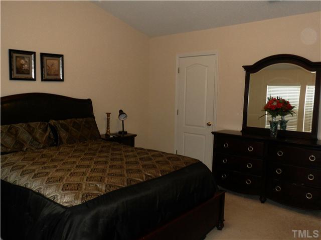 2909 Trassacks Drive Raleigh, NC 27610 - Photo 16 of 25 And this door leads to the Master Bath...