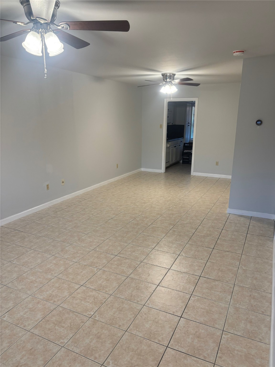 14333 Memorial Drive, Unit 39 Houston, TX 77079 - Photo 2 of 20 a view of an empty room with a window