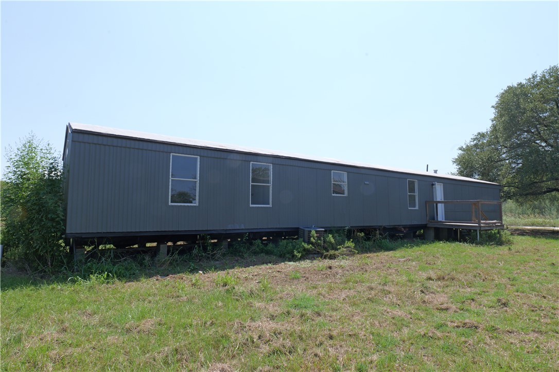 732 D Rogers Street Normangee, TX 77871 - Photo 1 of 12 a view of a backyard