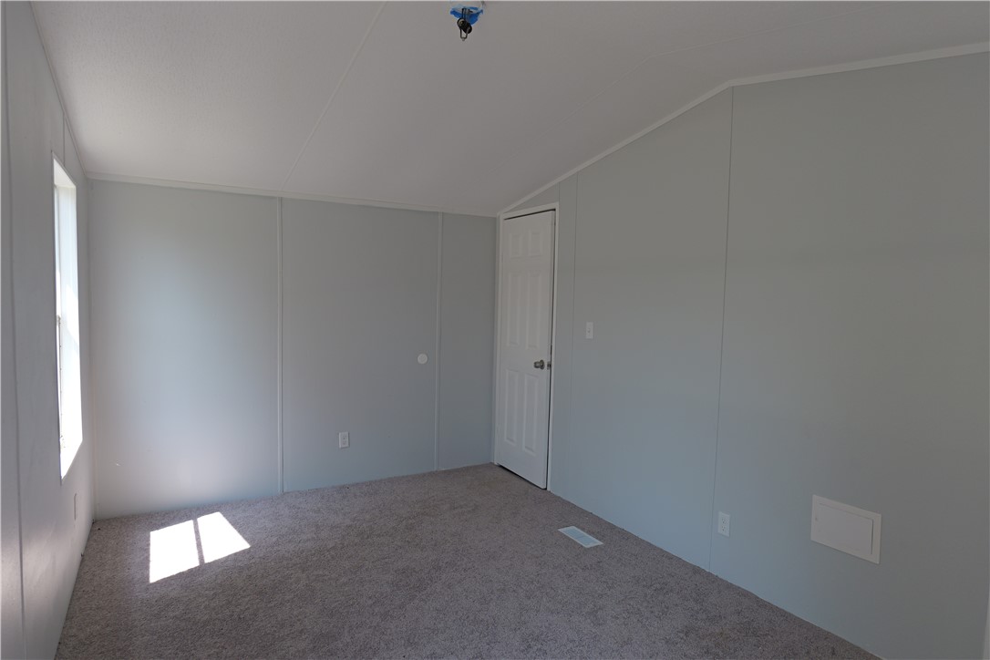 732 D Rogers Street Normangee, TX 77871 - Photo 10 of 12 a view of an empty room and window