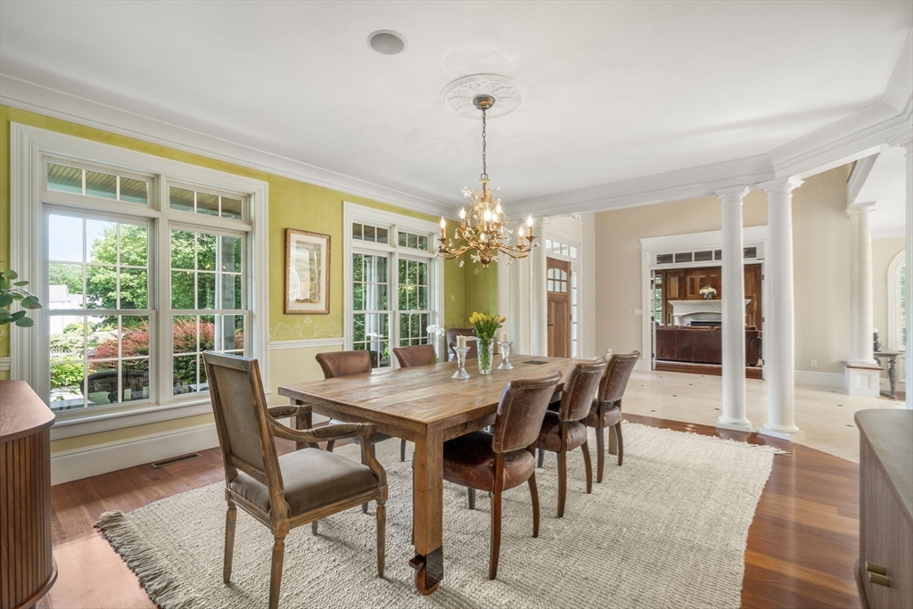 3 Stone Bridge Lane Milton, MA 02186 - Photo 11 of 37 a view of a dining room with furniture window and wooden floor