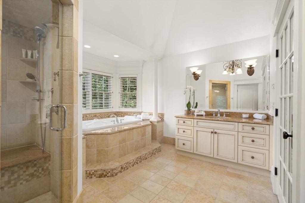 3 Stone Bridge Lane Milton, MA 02186 - Photo 22 of 37 a large bathroom with a granite countertop tub sink shower and mirror