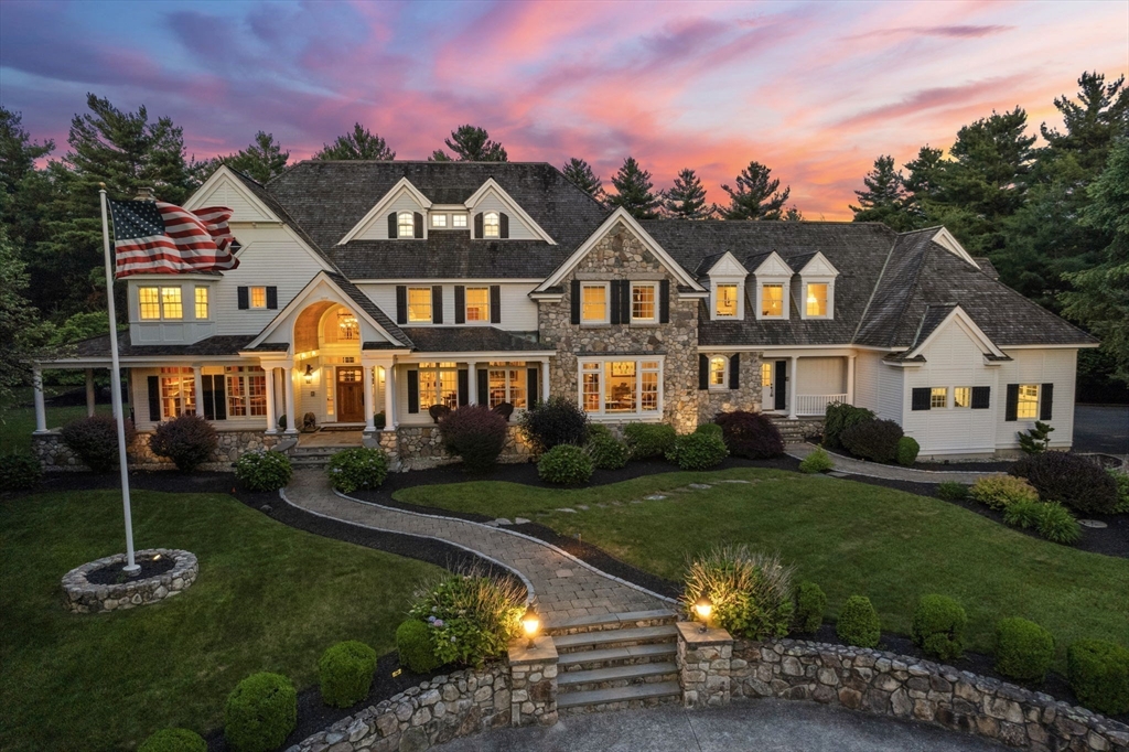 3 Stone Bridge Lane Milton, MA 02186 - Photo 33 of 37 a front view of a house with a yard