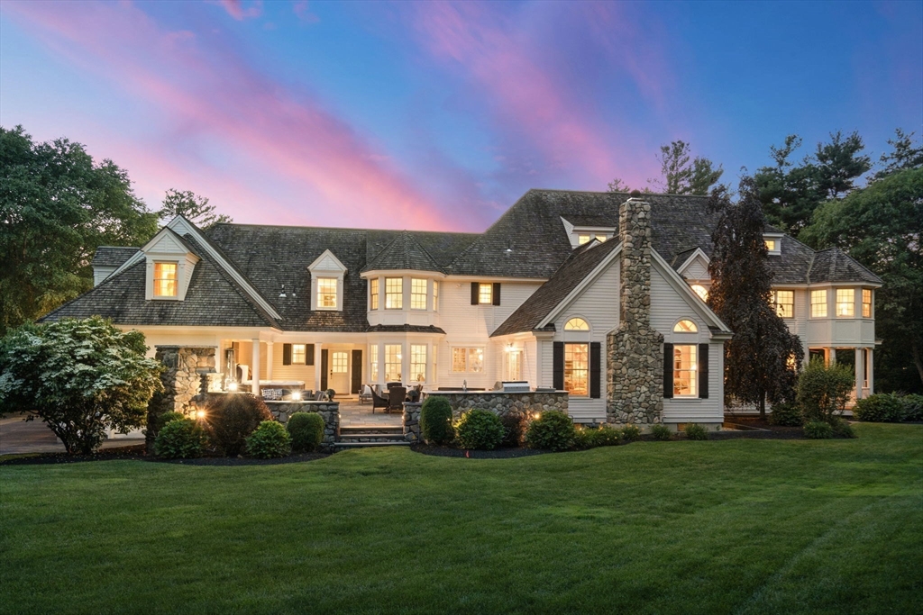 3 Stone Bridge Lane Milton, MA 02186 - Photo 35 of 37 a front view of a house with a yard