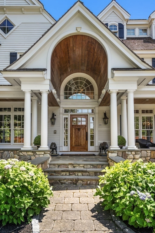3 Stone Bridge Lane Milton, MA 02186 - Photo 4 of 37 a front view of a house