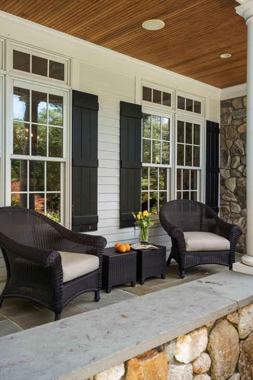 3 Stone Bridge Lane Milton, MA 02186 - Photo 5 of 37 a building outdoor space with patio furniture