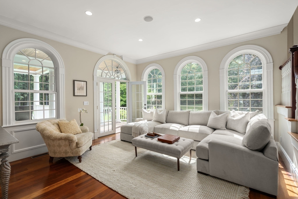 3 Stone Bridge Lane Milton, MA 02186 - Photo 8 of 37 a living room with furniture and a large window