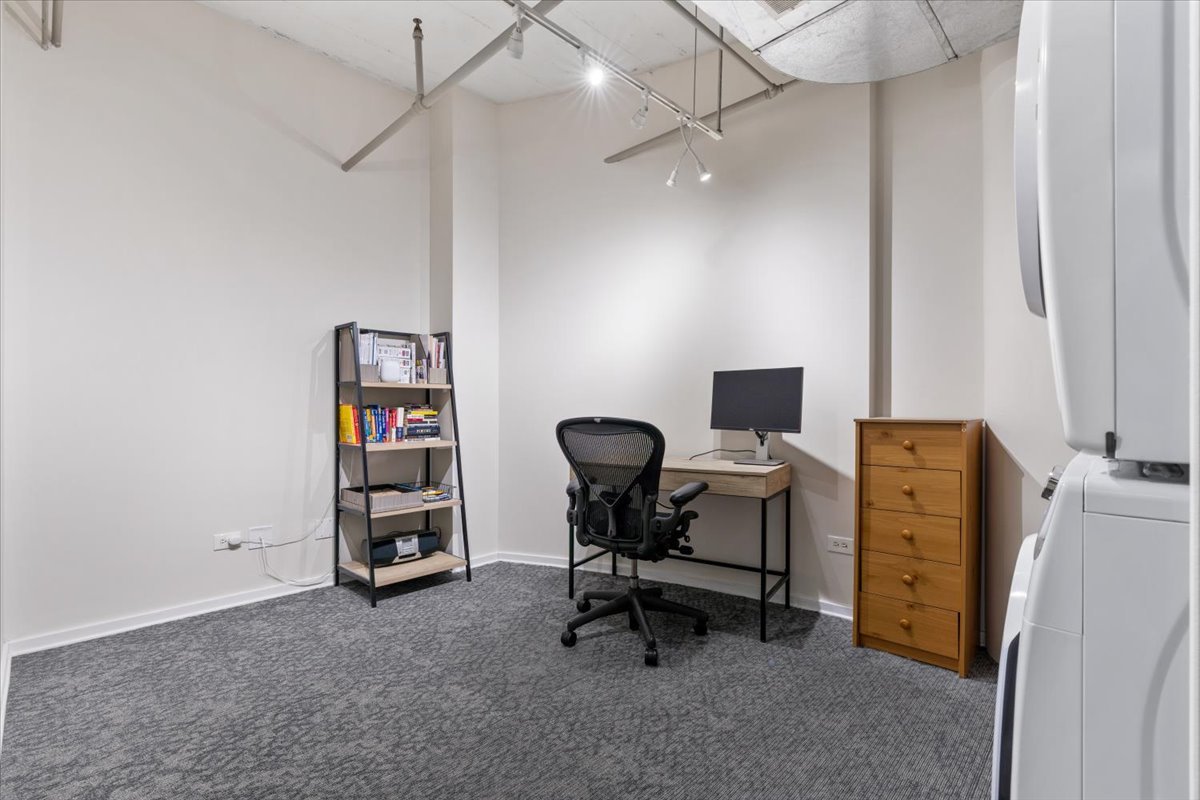 165 North Canal Street, Unit 706 Chicago, IL 60606 - Photo 17 of 27 a view of a workspace with furniture