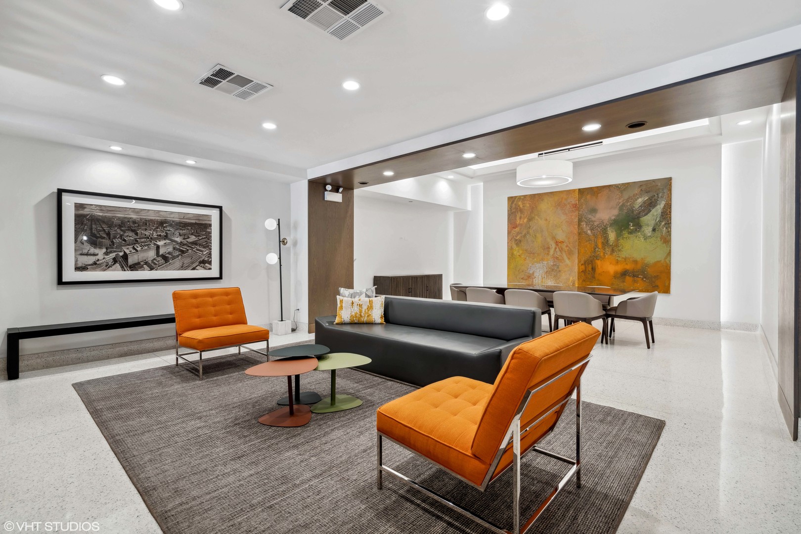 165 North Canal Street, Unit 706 Chicago, IL 60606 - Photo 23 of 27 a living room with furniture and a flat screen tv