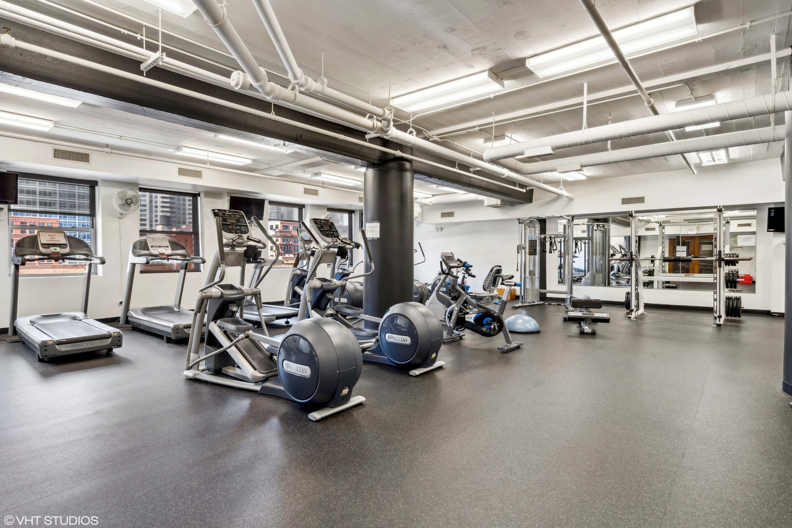 165 North Canal Street, Unit 706 Chicago, IL 60606 - Photo 24 of 27 a view of a room with gym equipment