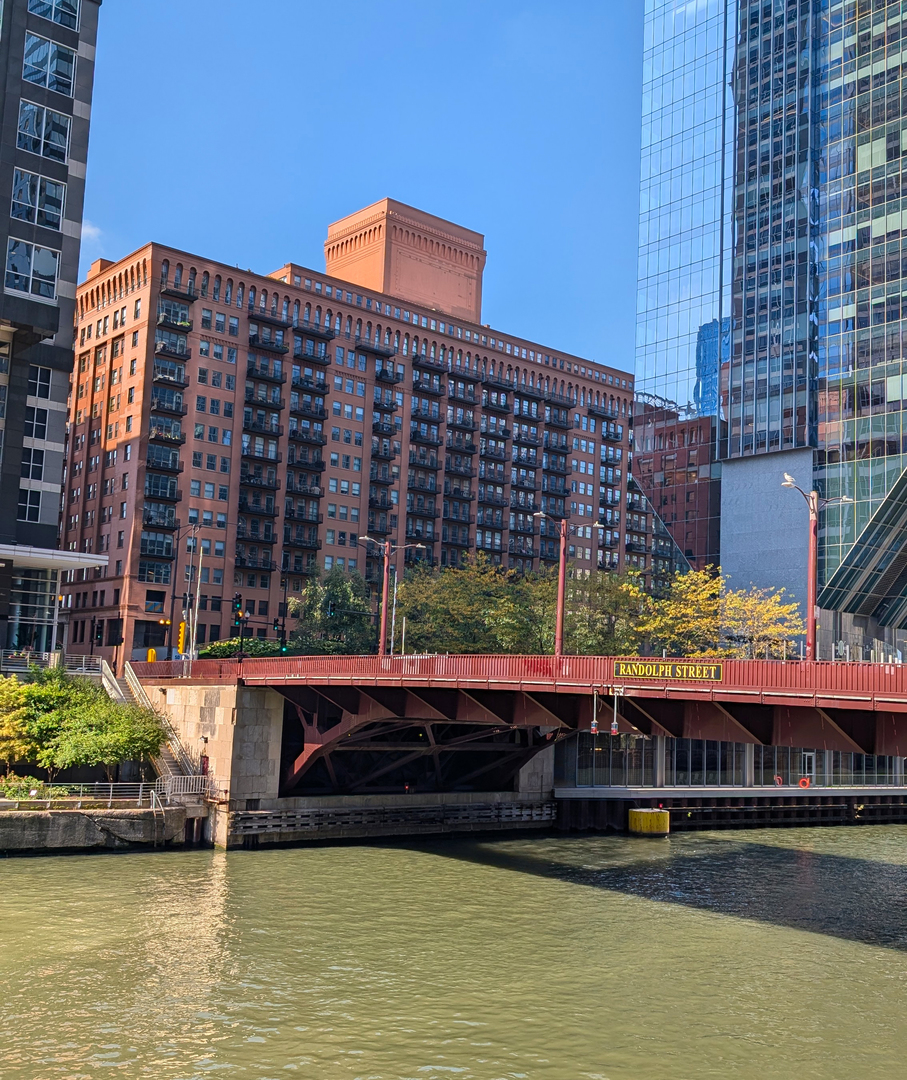 165 North Canal Street, Unit 706 Chicago, IL 60606 - Photo 25 of 27 a view of a swimming pool with a lounge chairs