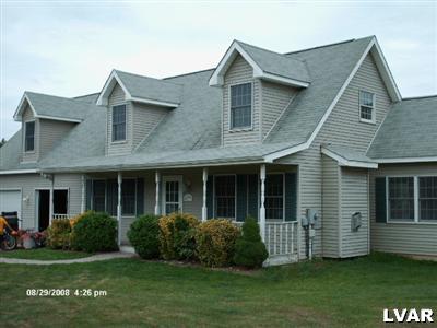 4977 McDermott Road Bangor, PA 18013 - Photo 2 of 2 a front view of a house with a garden