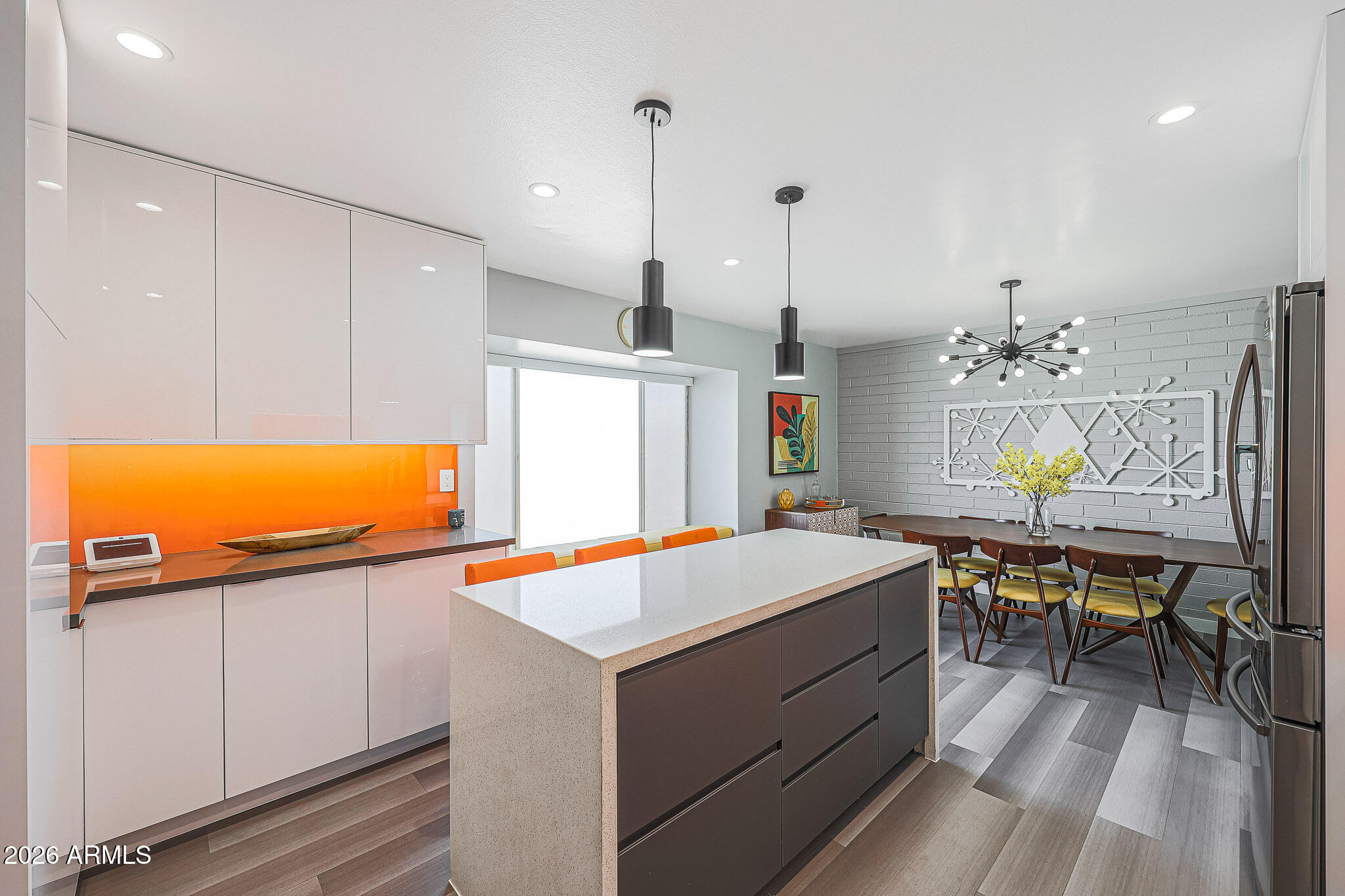 2201 East Marilyn Road Phoenix, AZ 85022 - Photo 12 of 47 a kitchen that has a table and chairs in it