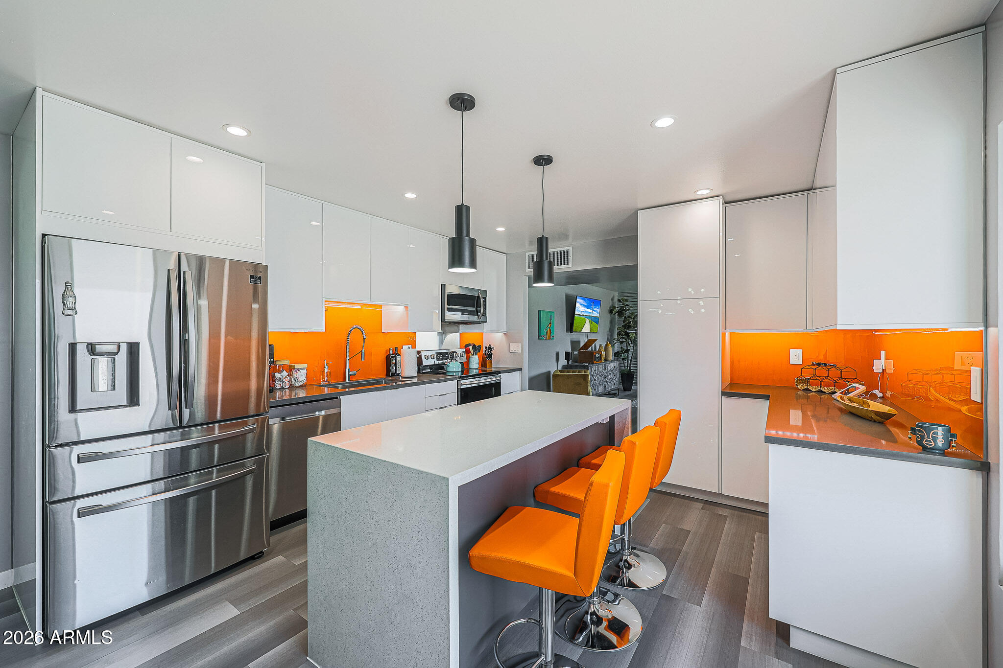 2201 East Marilyn Road Phoenix, AZ 85022 - Photo 15 of 47 a kitchen with stainless steel appliances granite countertop a refrigerator a stove and a sink