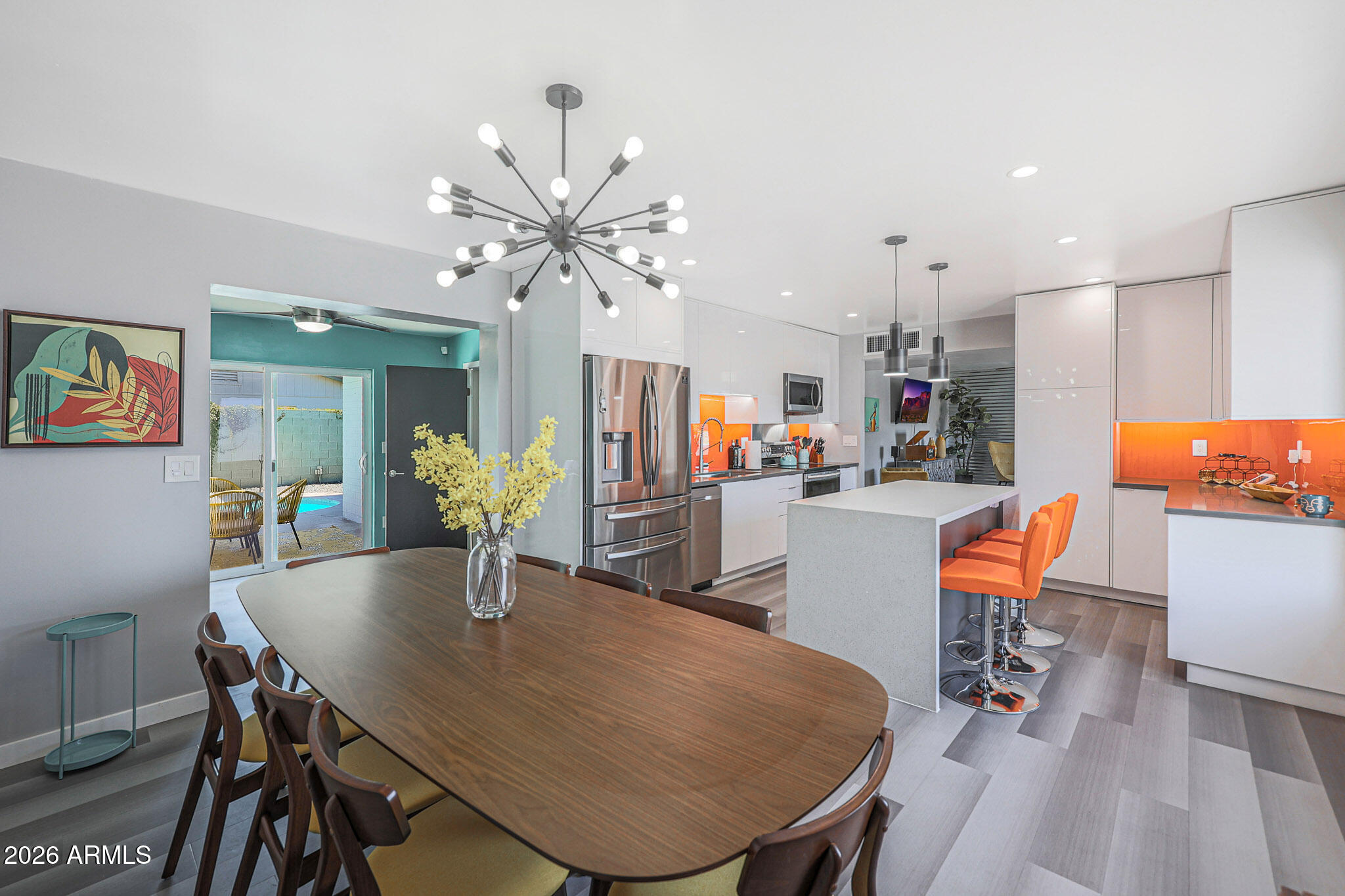 2201 East Marilyn Road Phoenix, AZ 85022 - Photo 21 of 47 a view of a dining room with furniture and wooden floor