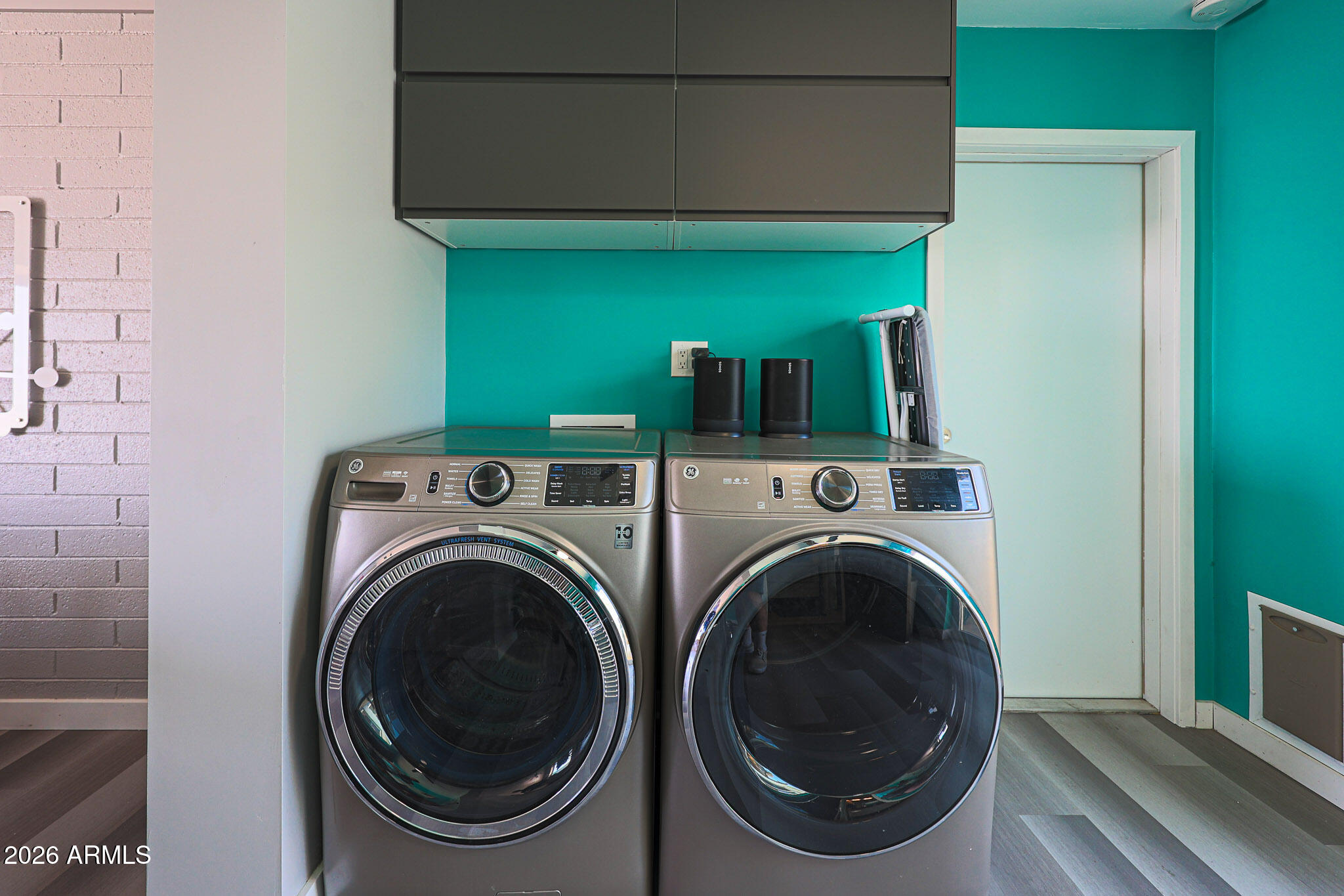 2201 East Marilyn Road Phoenix, AZ 85022 - Photo 25 of 47 a view of a hallway with washer and dryer