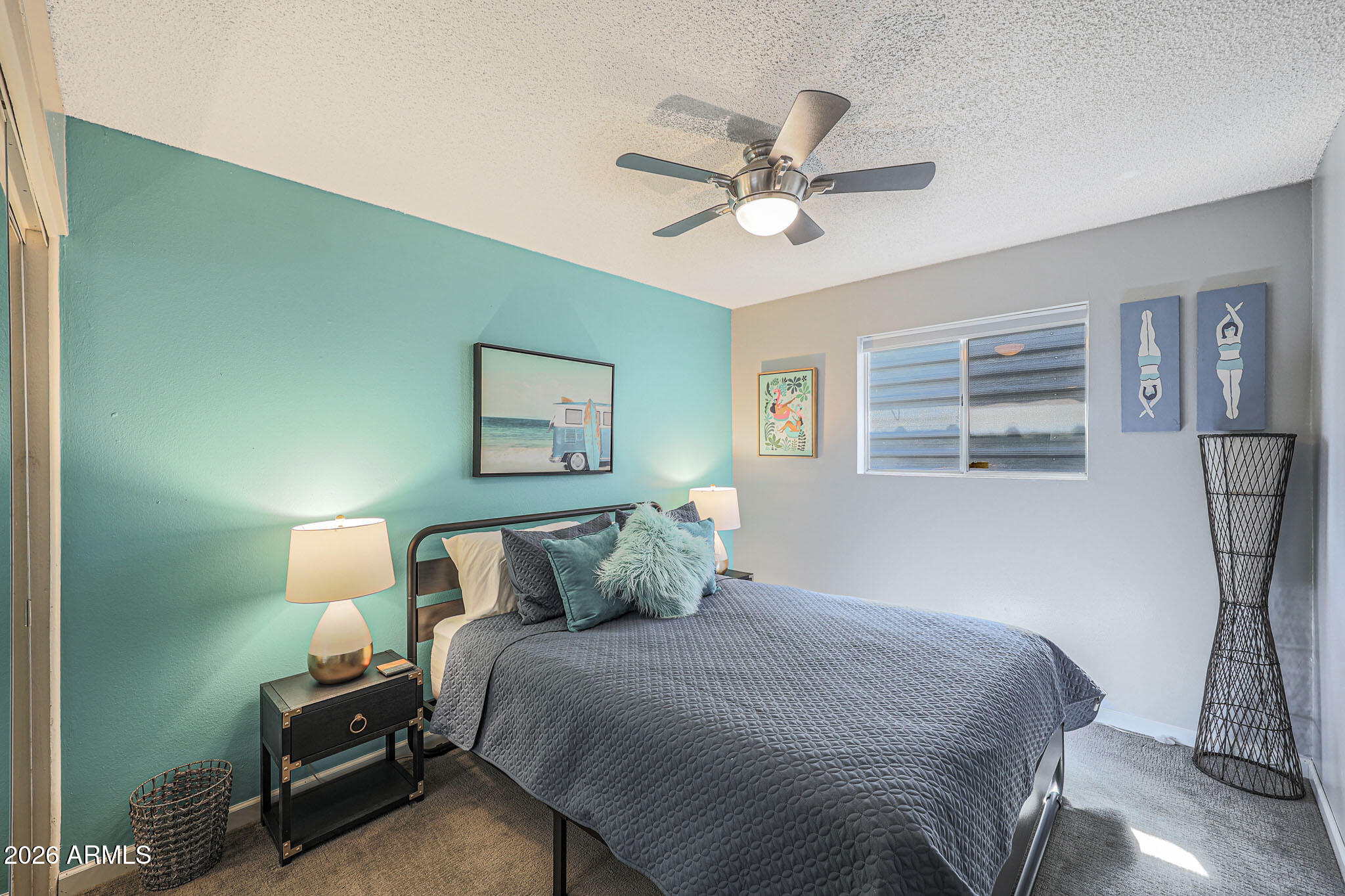 2201 East Marilyn Road Phoenix, AZ 85022 - Photo 34 of 47 a bedroom with a bed and window