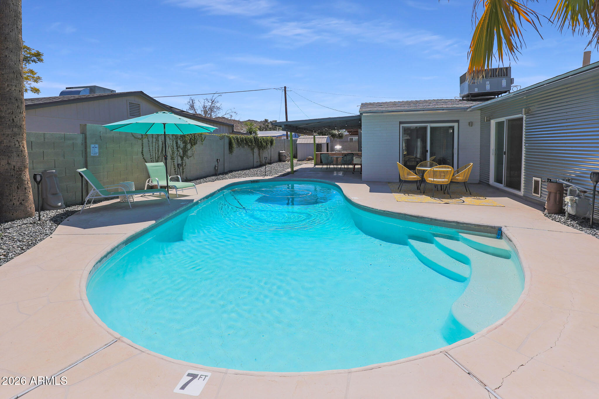 2201 East Marilyn Road Phoenix, AZ 85022 - Photo 39 of 47 a view of a swimming pool with a patio