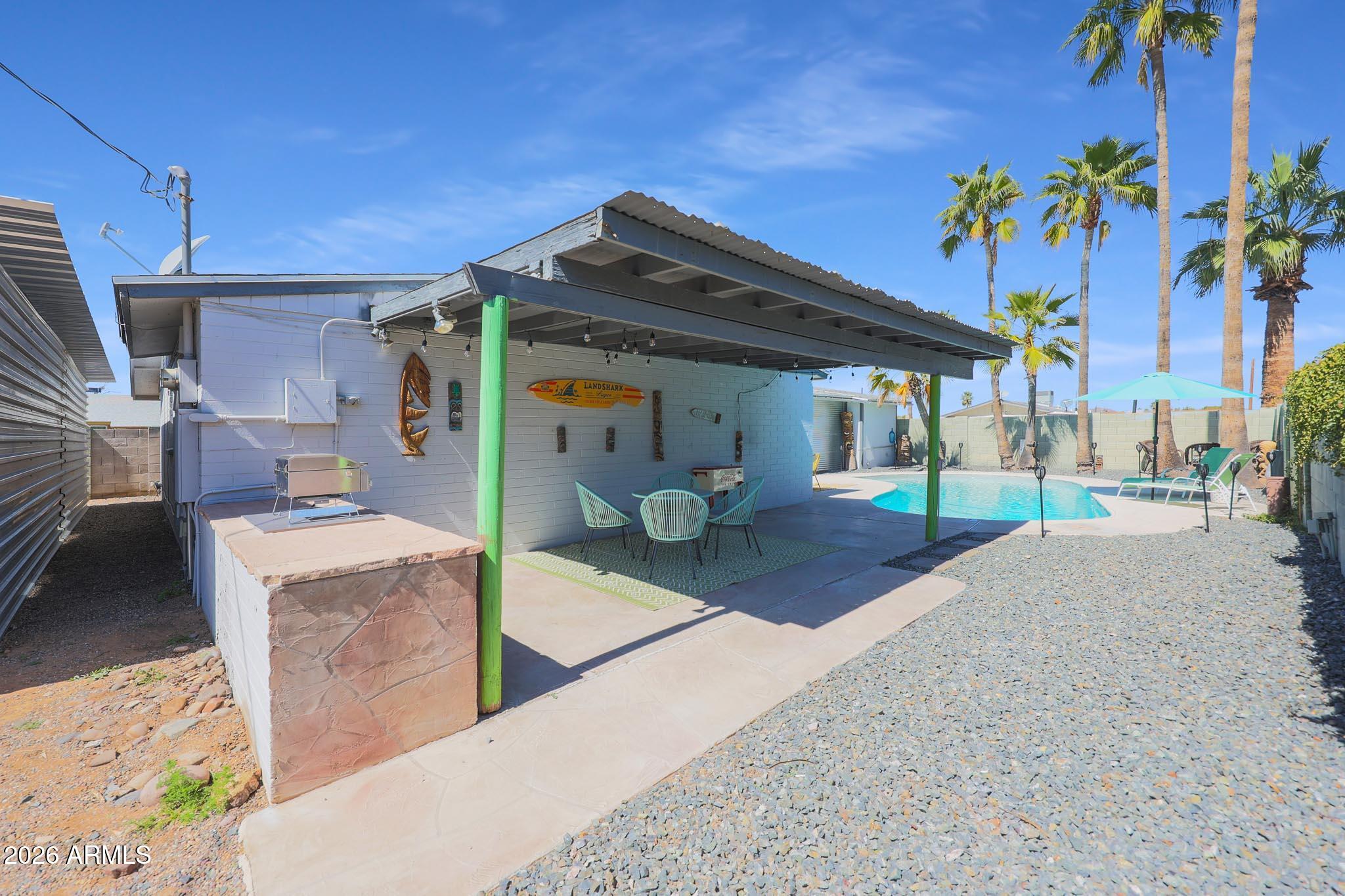 2201 East Marilyn Road Phoenix, AZ 85022 - Photo 42 of 47 a front view of a house with garden